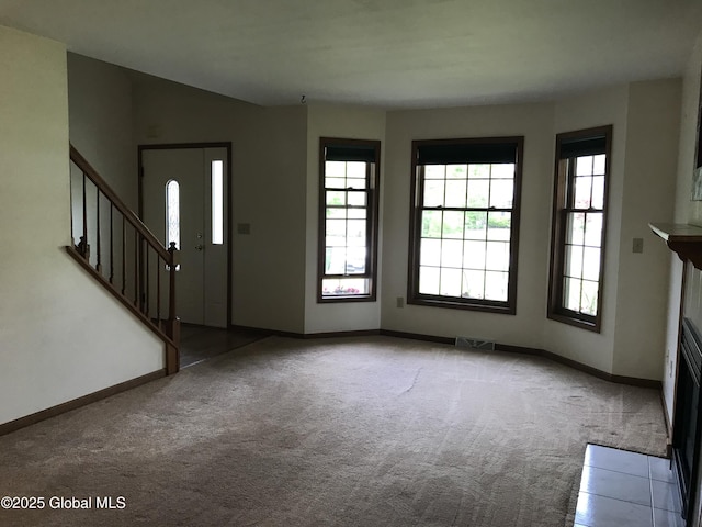 24 Fairmount Dr, Wilton, NY 12831 - entryway with carpet, stairway, and baseboards