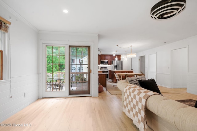 55 Journey Ln, Bethlehem, NY 12077 - living area with light wood-type flooring and crown molding
