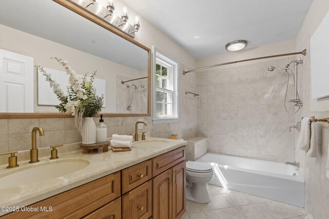 55 Journey Ln, Bethlehem, NY 12077 - full bathroom featuring shower / washtub combination, tile patterned floors, double vanity, and tile walls