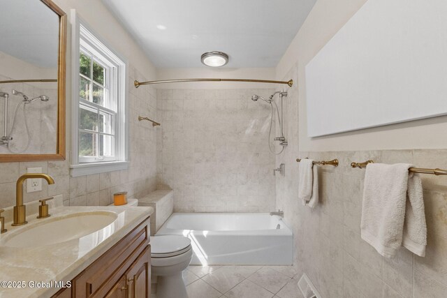 55 Journey Ln, Bethlehem, NY 12077 - bathroom featuring tile walls, shower / bath combination, vanity, and tile patterned floors