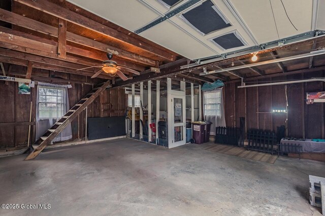 5518 Crooked St, Galway, NY 12074 - garage featuring wood walls and ceiling fan