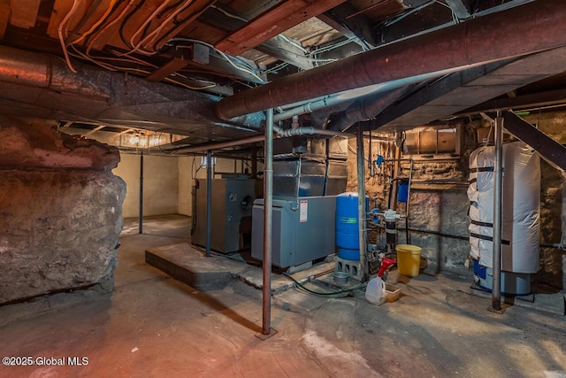 5518 Crooked St, Galway, NY 12074 - unfinished below grade area featuring a water pressure tank and heating unit