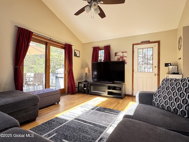 14 Wendom Rd, Albany, NY 12203 - living area with wood finished floors, ceiling fan, healthy amount of natural light, and high vaulted ceiling