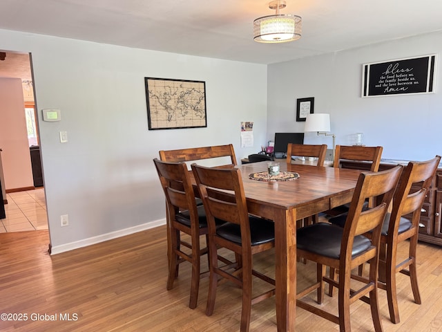 14 Wendom Rd, Albany, NY 12203 - dining area featuring light wood-type flooring and baseboards