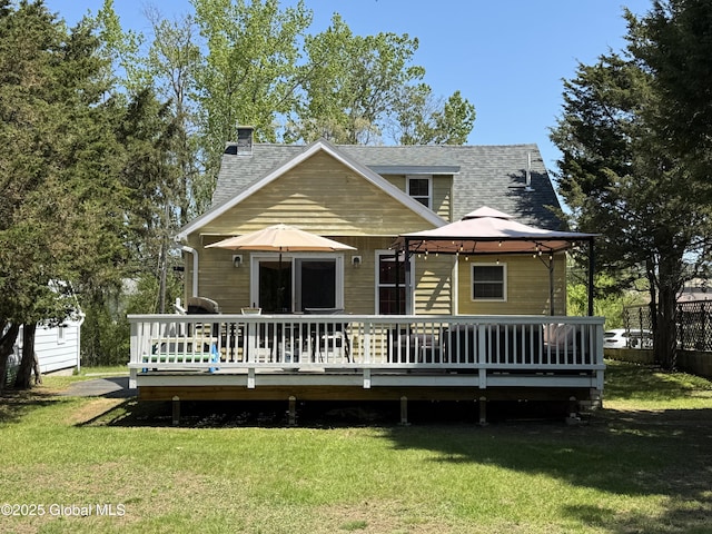 14 Wendom Rd, Albany, NY 12203 - back of house with a gazebo, a shingled roof, a yard, and a wooden deck