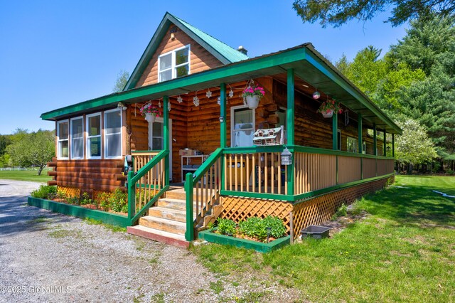 116 Medbury Rd, Greenfield, NY 12859 - log cabin with a porch, a front lawn, and log exterior