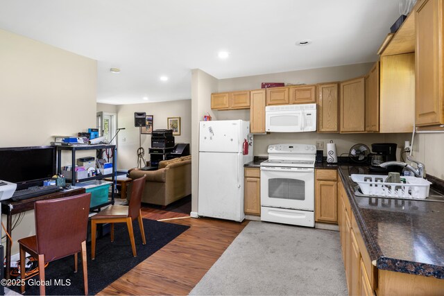 116 Medbury Rd, Greenfield, NY 12859 - kitchen with white appliances, wood finished floors, a sink, dark countertops, and recessed lighting
