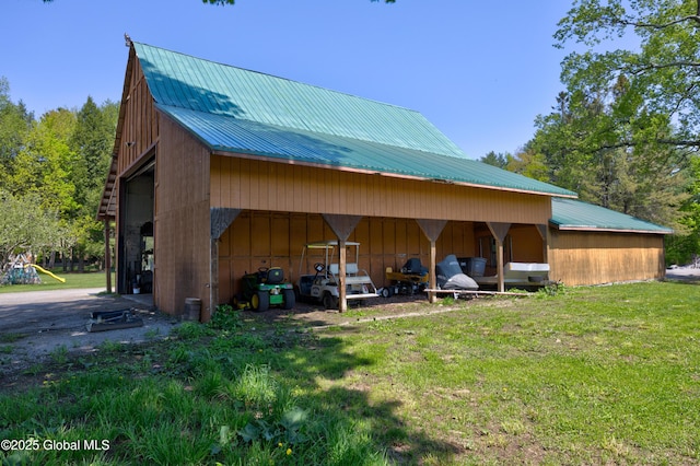 116 Medbury Rd, Greenfield, NY 12859 - view of pole building with a carport and a lawn