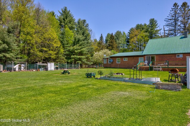 116 Medbury Rd, Greenfield, NY 12859 - view of yard featuring a wooden deck and a garden