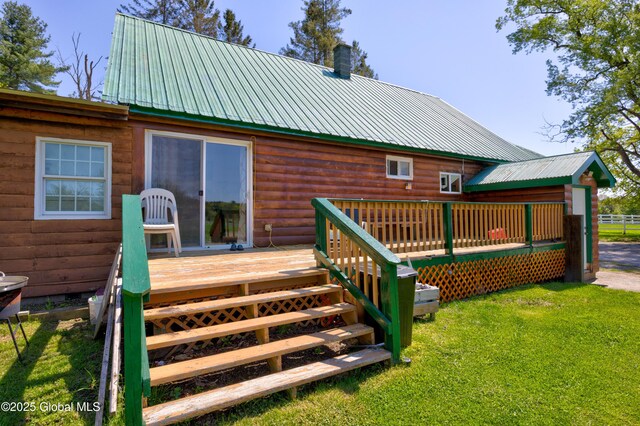 116 Medbury Rd, Greenfield, NY 12859 - rear view of house featuring a wooden deck, a chimney, and metal roof