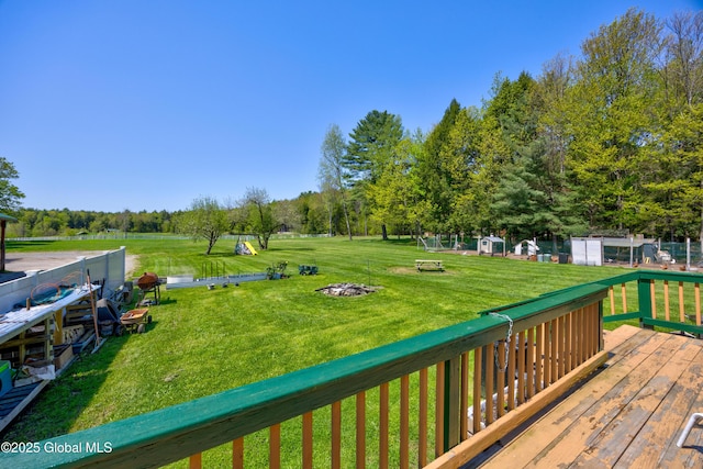 116 Medbury Rd, Greenfield, NY 12859 - deck with a yard and view of wooded area