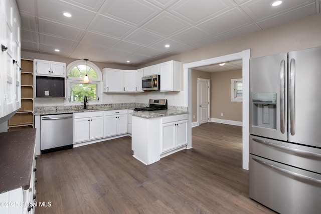185 Bay St, Glens Falls, NY 12801 - kitchen featuring appliances with stainless steel finishes, a sink, recessed lighting, white cabinets, and dark wood-style flooring