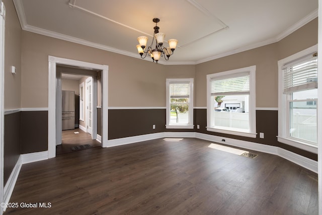 185 Bay St, Glens Falls, NY 12801 - unfurnished room featuring a chandelier, dark wood-style floors, baseboards, and ornamental molding