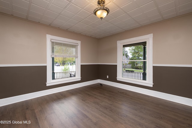 185 Bay St, Glens Falls, NY 12801 - spare room featuring baseboards and wood finished floors