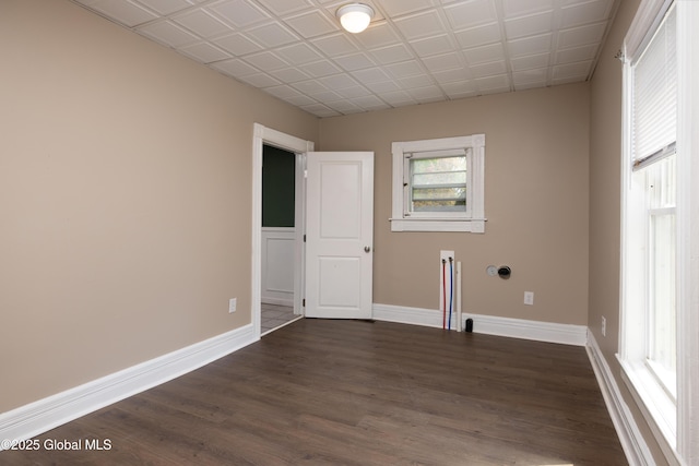 185 Bay St, Glens Falls, NY 12801 - spare room with dark wood-style flooring and baseboards