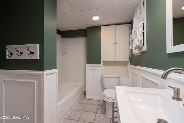 185 Bay St, Glens Falls, NY 12801 - full bath with a sink, recessed lighting, toilet, wainscoting, and bathing tub / shower combination