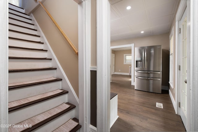 185 Bay St, Glens Falls, NY 12801 - staircase featuring recessed lighting, wood finished floors, and baseboards
