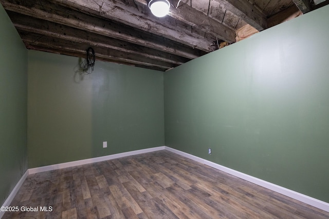 185 Bay St, Glens Falls, NY 12801 - finished below grade area with dark wood-style floors and baseboards