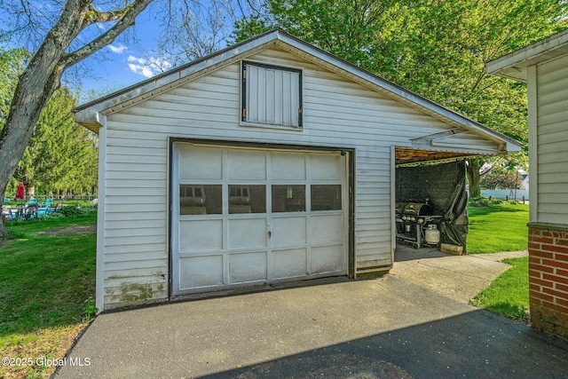 22 Center St, Fort Edward, NY 12828 - detached garage featuring asphalt driveway
