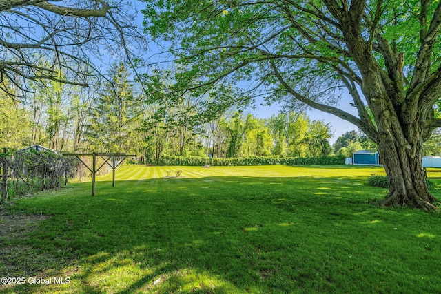 22 Center St, Fort Edward, NY 12828 - view of grassy yard featuring view of wooded area