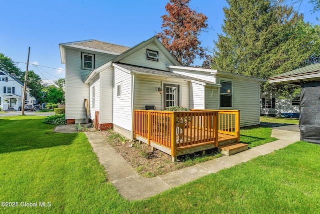 22 Center St, Fort Edward, NY 12828 - back of property featuring a lawn and a deck