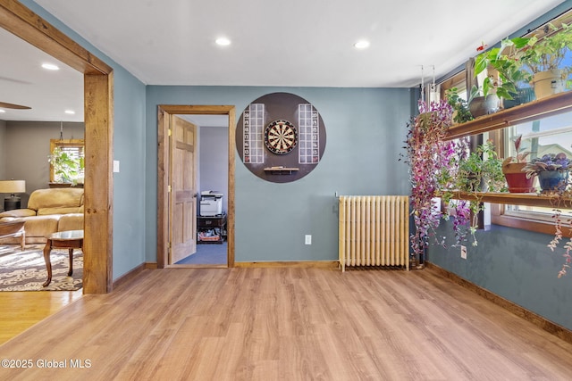 22 Center St, Fort Edward, NY 12828 - spare room with radiator, wood finished floors, recessed lighting, baseboards, and a ceiling fan