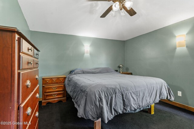 22 Center St, Fort Edward, NY 12828 - bedroom with dark carpet, vaulted ceiling, baseboards, and ceiling fan