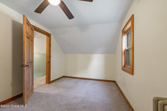 22 Center St, Fort Edward, NY 12828 - bonus room featuring light colored carpet, a ceiling fan, lofted ceiling, radiator, and baseboards
