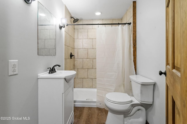 22 Center St, Fort Edward, NY 12828 - bathroom featuring toilet, a shower stall, vanity, and wood finished floors