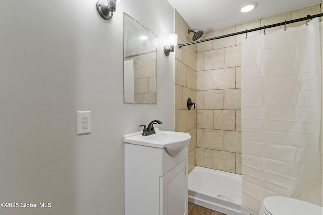 22 Center St, Fort Edward, NY 12828 - bathroom featuring a tile shower, vanity, and toilet