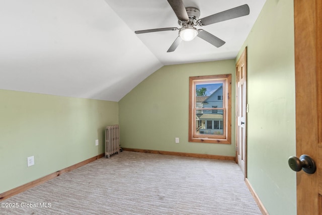 22 Center St, Fort Edward, NY 12828 - bonus room with radiator, lofted ceiling, light colored carpet, baseboards, and ceiling fan