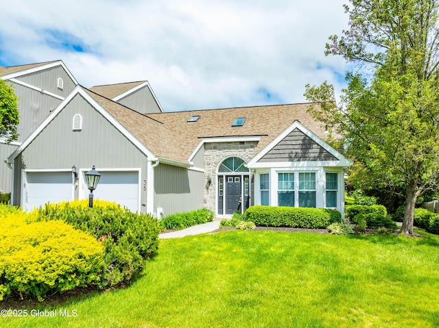 36 Greystone Dr, Guilderland, NY 12186 - view of front of property featuring a front yard, a shingled roof, a garage, and stone siding