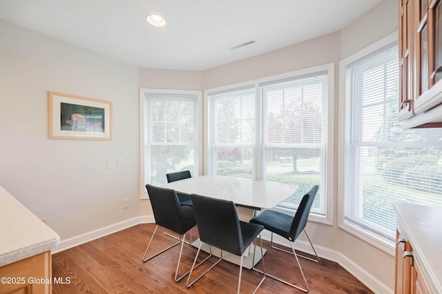 36 Greystone Dr, Guilderland, NY 12186 - dining space featuring plenty of natural light, wood finished floors, baseboards, and recessed lighting