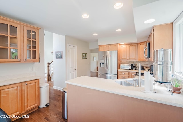 36 Greystone Dr, Guilderland, NY 12186 - kitchen with stainless steel appliances, light brown cabinetry, glass insert cabinets, light countertops, and dark wood-style floors