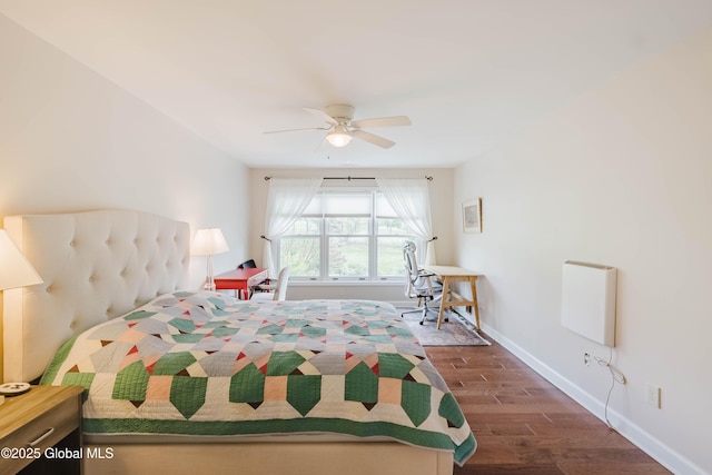 36 Greystone Dr, Guilderland, NY 12186 - bedroom with dark wood-style flooring, baseboards, a ceiling fan, and heating unit