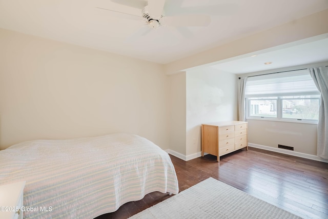36 Greystone Dr, Guilderland, NY 12186 - bedroom with dark wood-type flooring, baseboards, and a ceiling fan