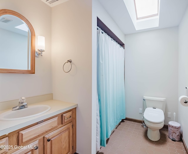 36 Greystone Dr, Guilderland, NY 12186 - bathroom featuring toilet, a skylight, vanity, and a shower with curtain