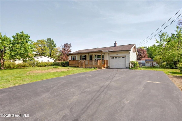60 Edmund Dr, Milton, NY 12020 - single story home with an attached garage, covered porch, a front lawn, driveway, and a chimney