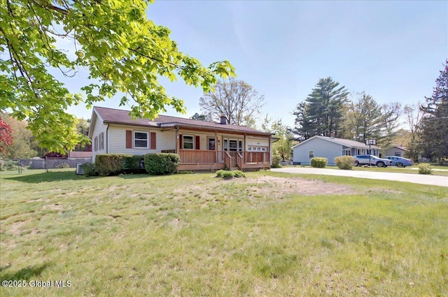 60 Edmund Dr, Milton, NY 12020 - ranch-style home with a porch, a chimney, and a front lawn