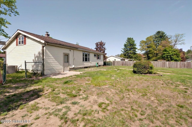 60 Edmund Dr, Milton, NY 12020 - rear view of property featuring central AC unit and a chimney