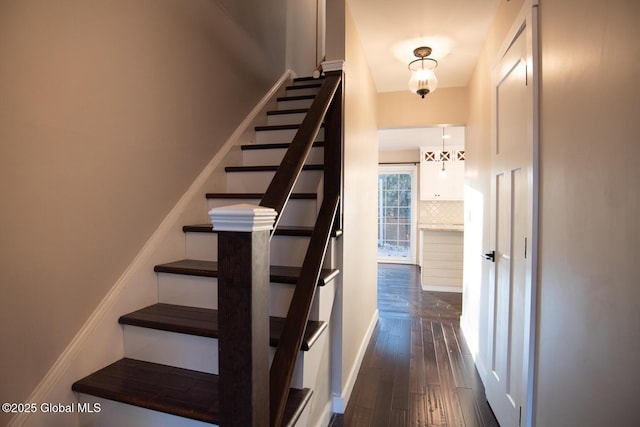 18 Alva St, East Greenbush, NY 12061 - staircase featuring wood finished floors and baseboards