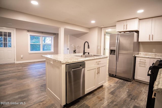 18 Alva St, East Greenbush, NY 12061 - kitchen featuring stainless steel appliances, a sink, dark wood-style floors, a kitchen island with sink, and white cabinetry