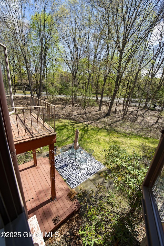 deck featuring a lawn