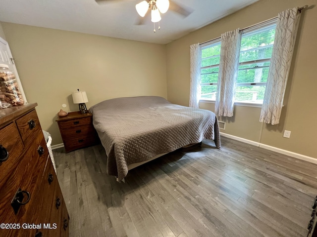 25 Hilton Dr, Moreau, NY 12803 - bedroom featuring light wood finished floors, baseboards, and ceiling fan