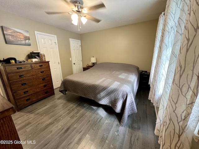 25 Hilton Dr, Moreau, NY 12803 - bedroom featuring wood finished floors and ceiling fan