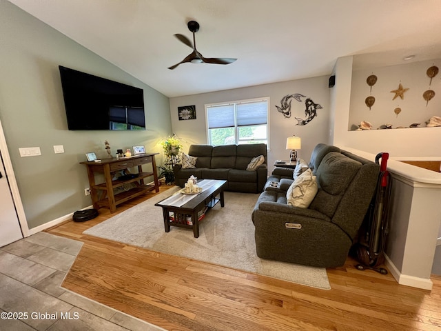 25 Hilton Dr, Moreau, NY 12803 - living room featuring ceiling fan, wood finished floors, vaulted ceiling, and baseboards
