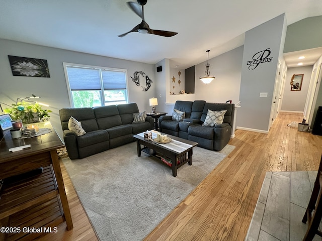 25 Hilton Dr, Moreau, NY 12803 - living area with a ceiling fan, lofted ceiling, light wood-style flooring, and baseboards