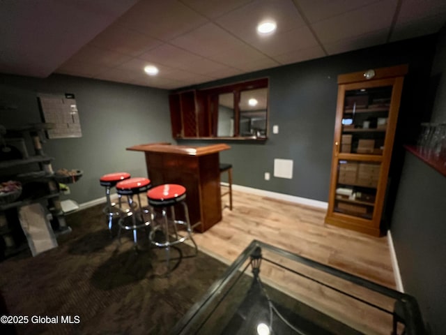 25 Hilton Dr, Moreau, NY 12803 - indoor dry bar featuring baseboards, a paneled ceiling, and wood finished floors