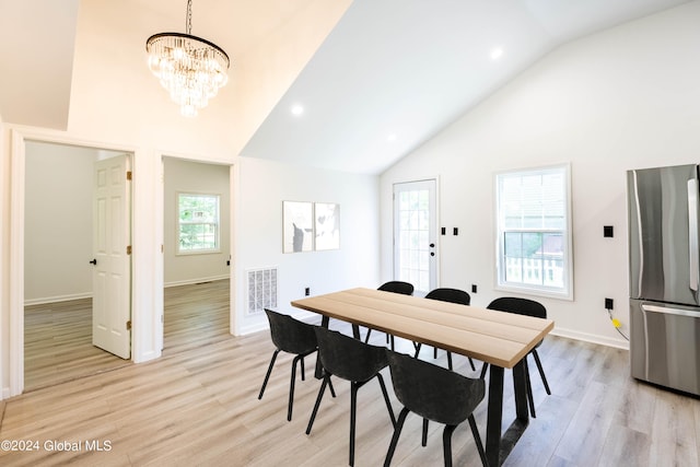 15 Schaffer Dr, Colonie, NY 12047 - dining area with light wood-style flooring, high vaulted ceiling, a chandelier, baseboards, and recessed lighting