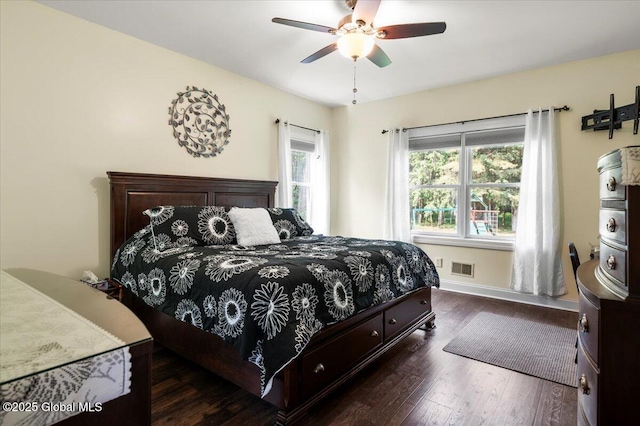 264 Edie Rd, Wilton, NY 12866 - bedroom featuring dark wood-style flooring, a ceiling fan, and baseboards